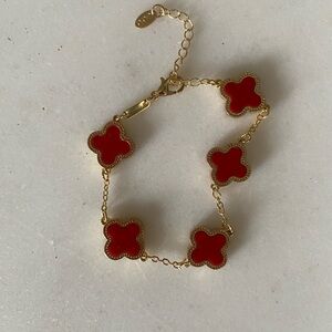 Elegant Red and Gold Clover Bracelet